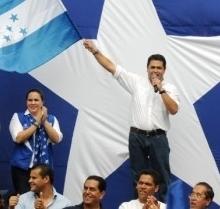 Man waving Honduran Flag