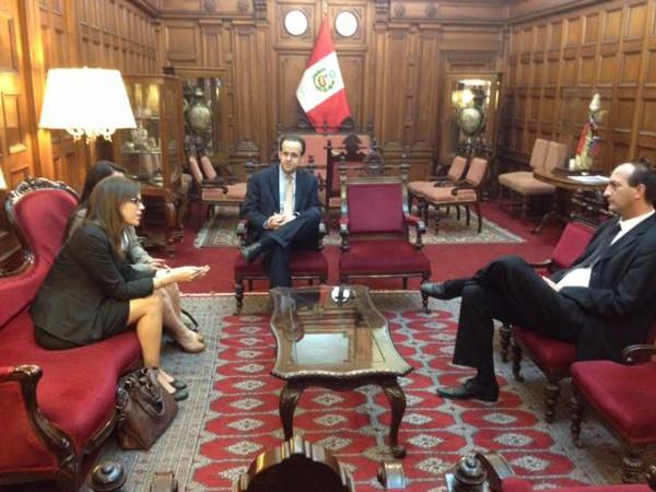 Christine is shown here meeting with Peruvian congressional members.
