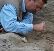 John Verano working at an archaeological dig site 